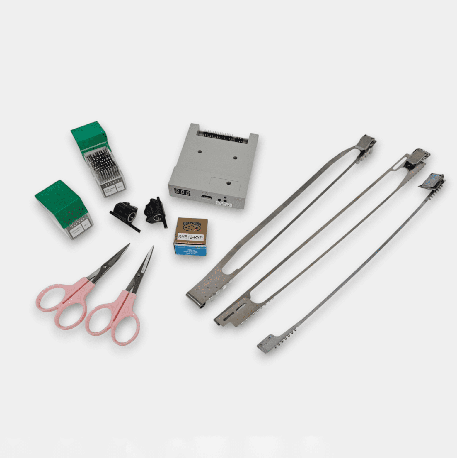 Embroidery machine parts, cap frames and lids